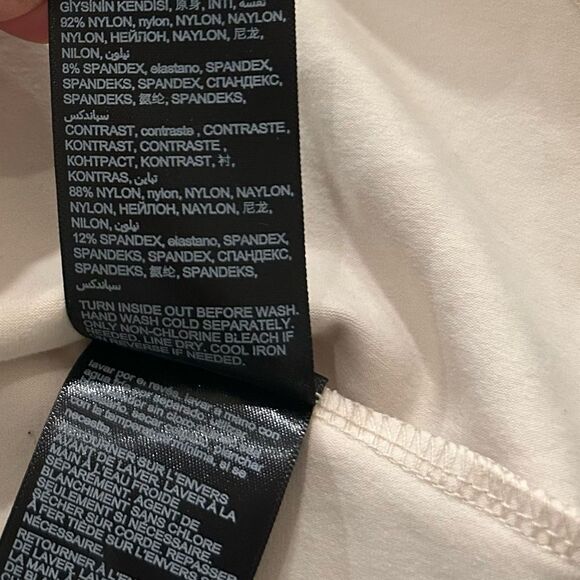 BEBE Cream Lace Panel Peplum Top Size XS - Picture 6 of 10